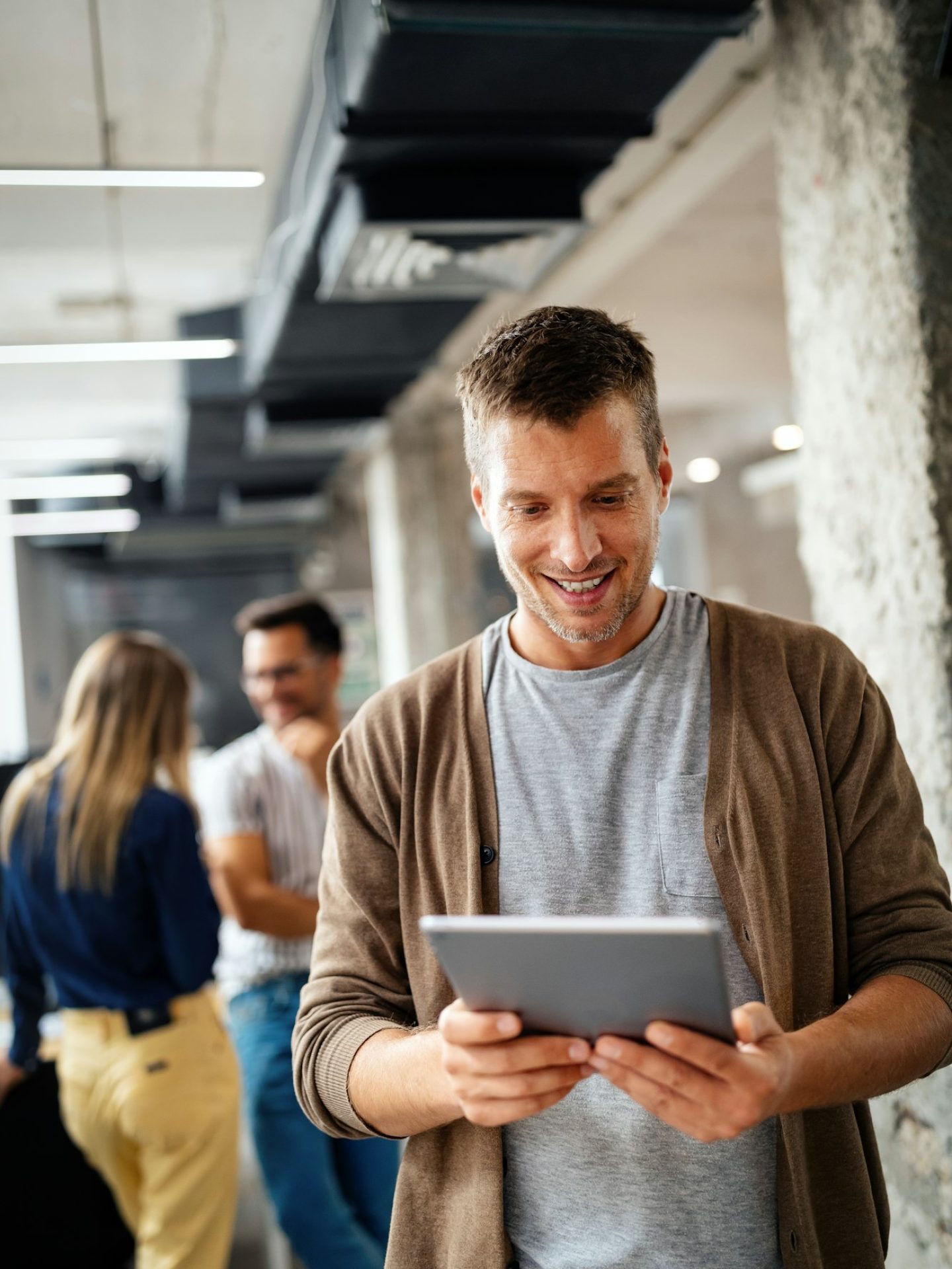 Company employees working in software development and designer office